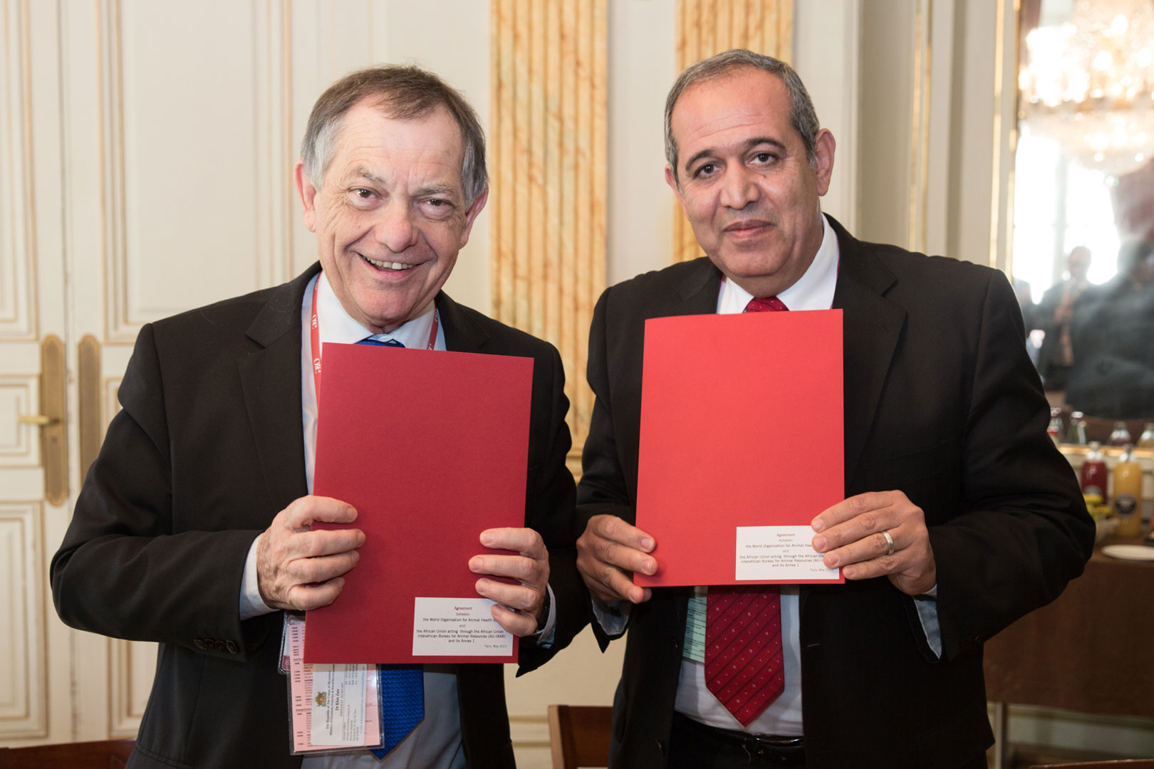  © 2015 AU-IBAR. Dr. Bernard Vallat (left), Director General, OIE and Prof. Ahmed Elsawalhy (right), Director, AU-IBAR with the signed agreement.