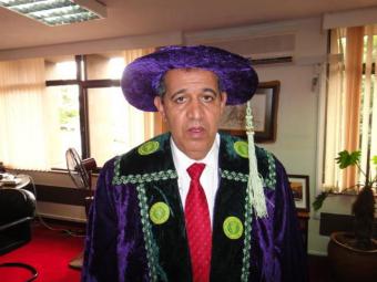 © 2013 AU-IBAR. Prof Ahmed Elsawalhy wearing the academic regalia of the FCVSN in his office at AU-IBAR, Nairobi.